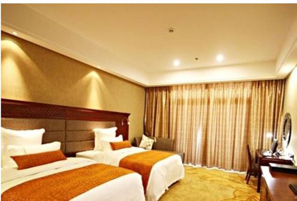 Ramada Plaza Xishuangbanna Hotel Exterior photo