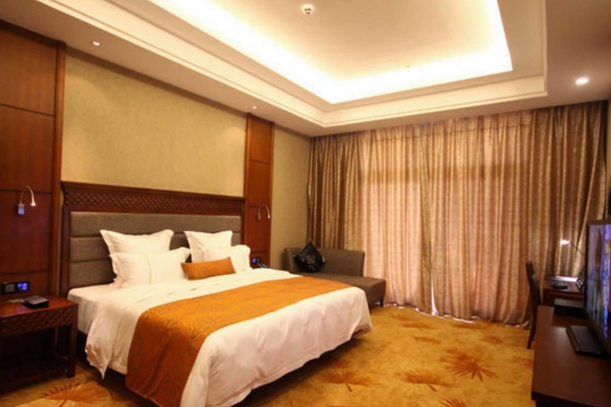Ramada Plaza Xishuangbanna Hotel Exterior photo